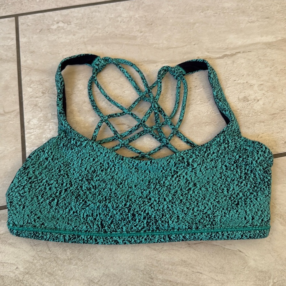Teal and black lululemon cross back sports bra size 4